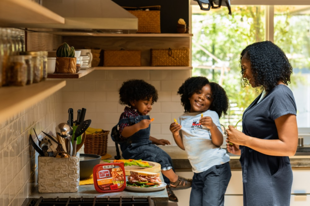 A family eating in the kitchen